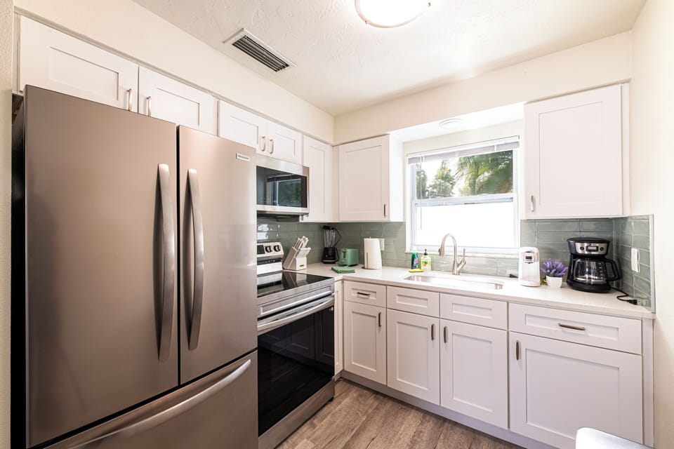 Fridge with ice maker. Fully Stocked Kitchen