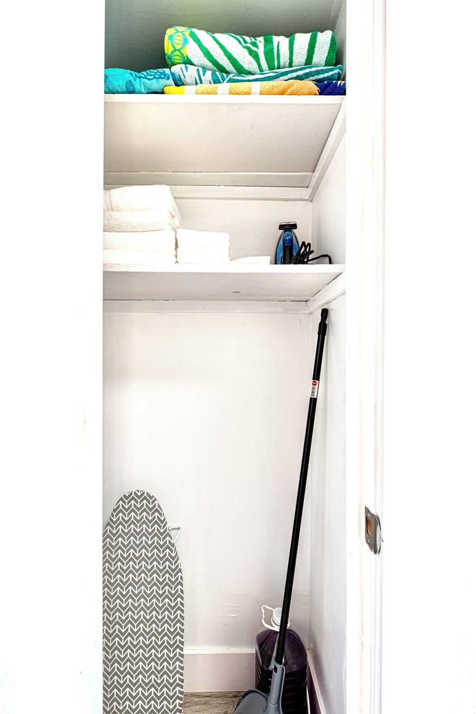 Iron and Broom Provided in Linen Closet