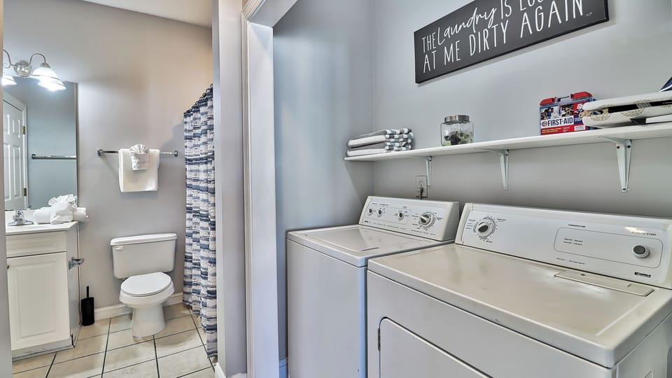 In-unit laundry beside the second full bathroom for added convenience.
