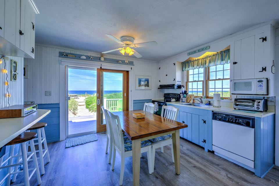 Enter into the kitchen with slider to the deck.