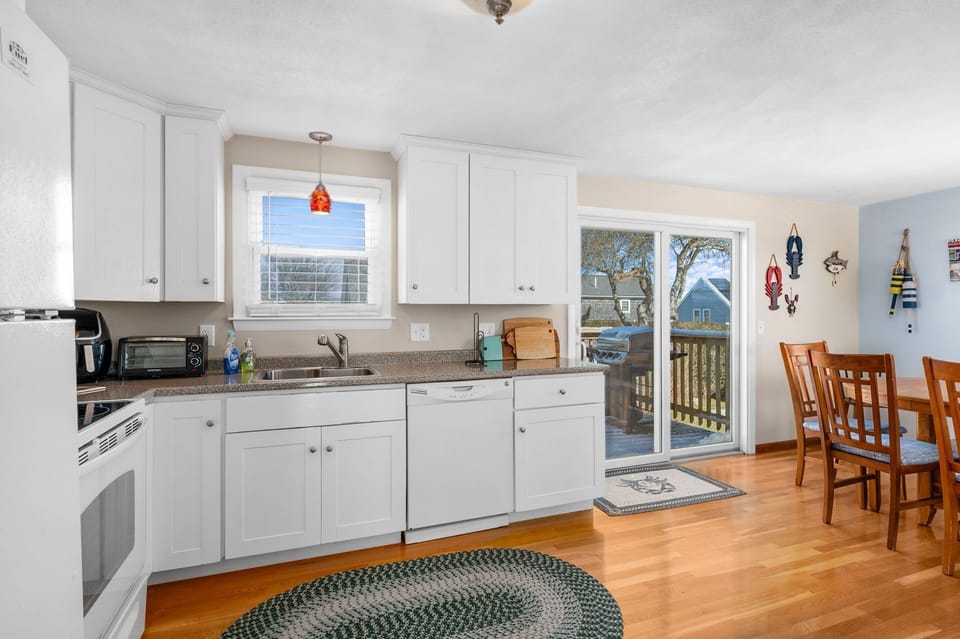 Kitchen with slider to deck