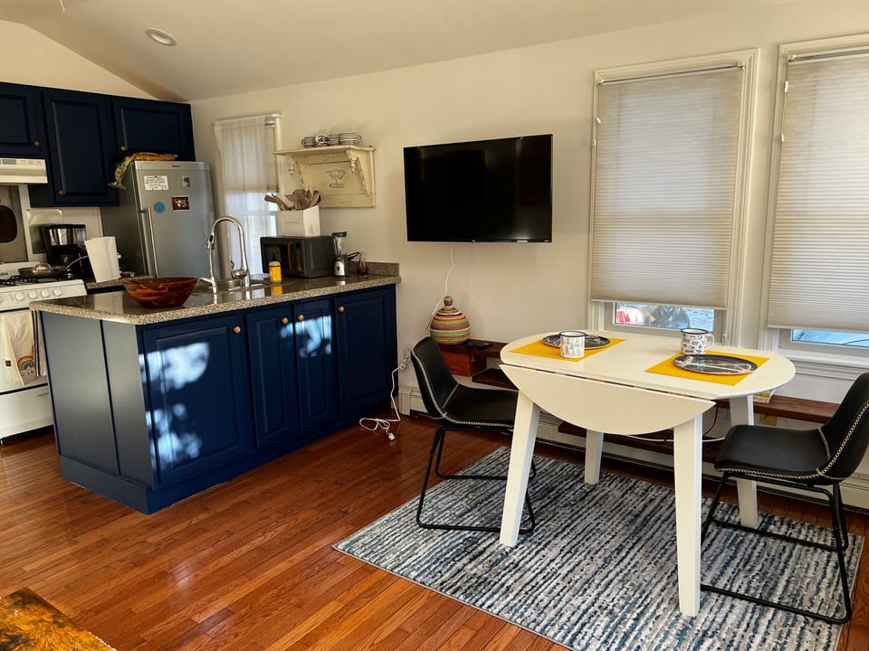 Kitchen with designated dining area. Table sits 4 comfortably. 