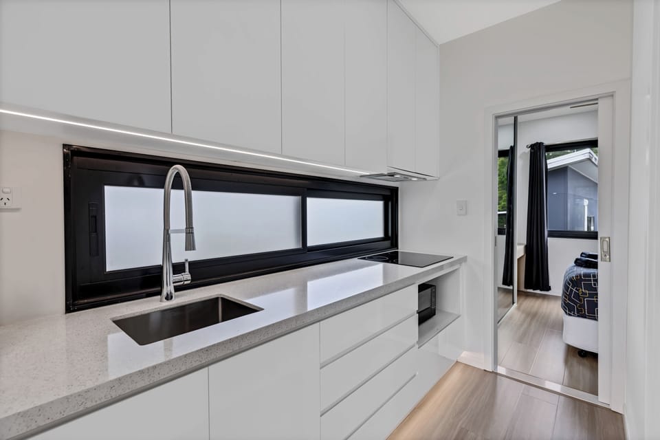 Villa | Private kitchen | Microwave, electric kettle, toaster, dining table