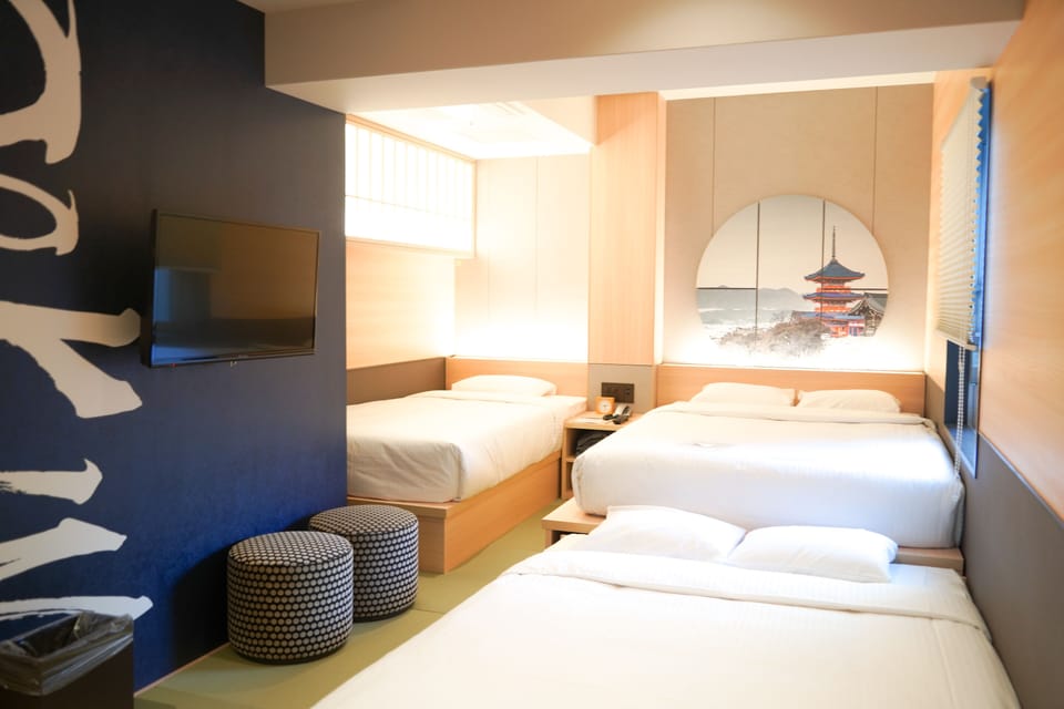 Family Triple Room | In-room safe, iron/ironing board, free WiFi, bed sheets