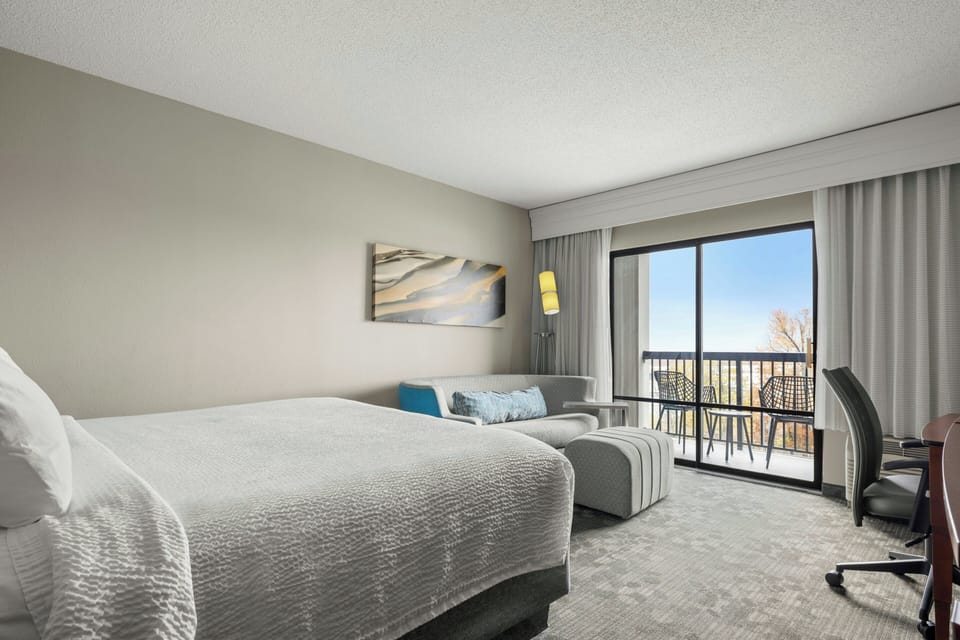 Room, 1 King Bed with Sofa bed, Balcony | In-room safe, desk, laptop workspace, blackout drapes