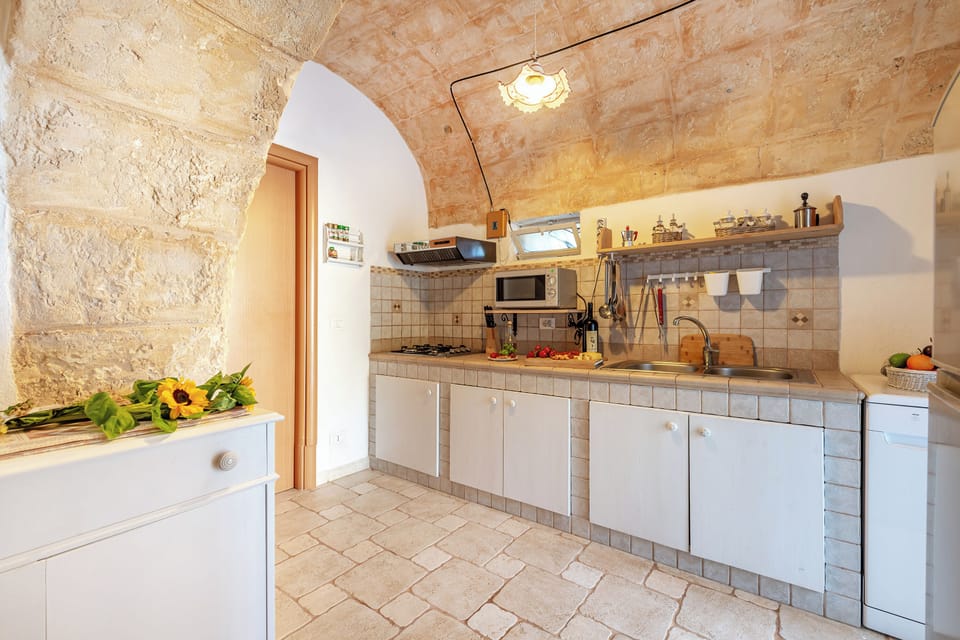 Family Villa, Multiple Bedrooms (Trullo Delle Ginestre Private Pool) | Private kitchen | Fridge, microwave, stovetop, dishwasher