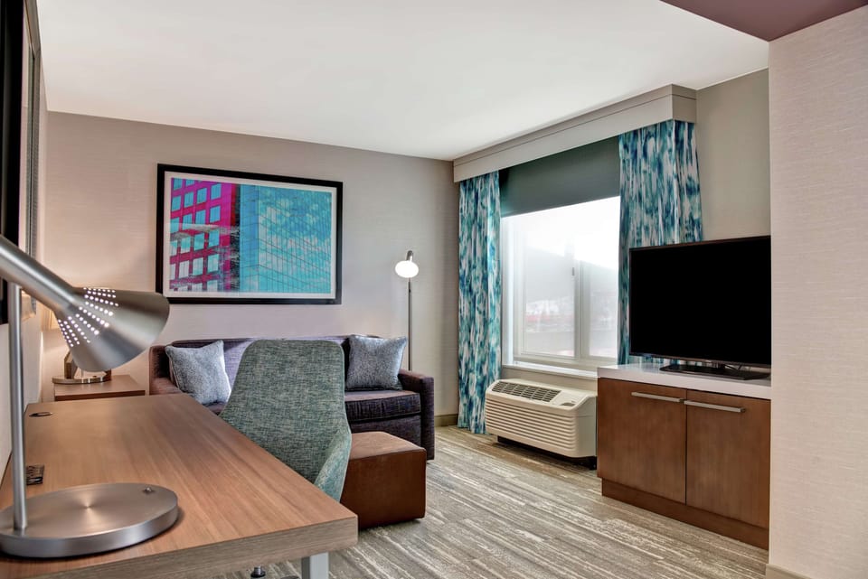 Junior Suite, 1 King Bed | Living area | 42-inch flat-screen TV with cable channels, TV, pay movies