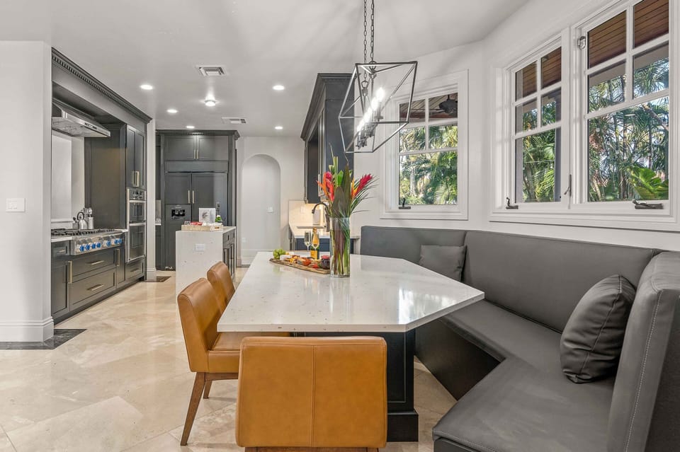 The breakfast nook is conveniently connected to the kitchen which seats eight.