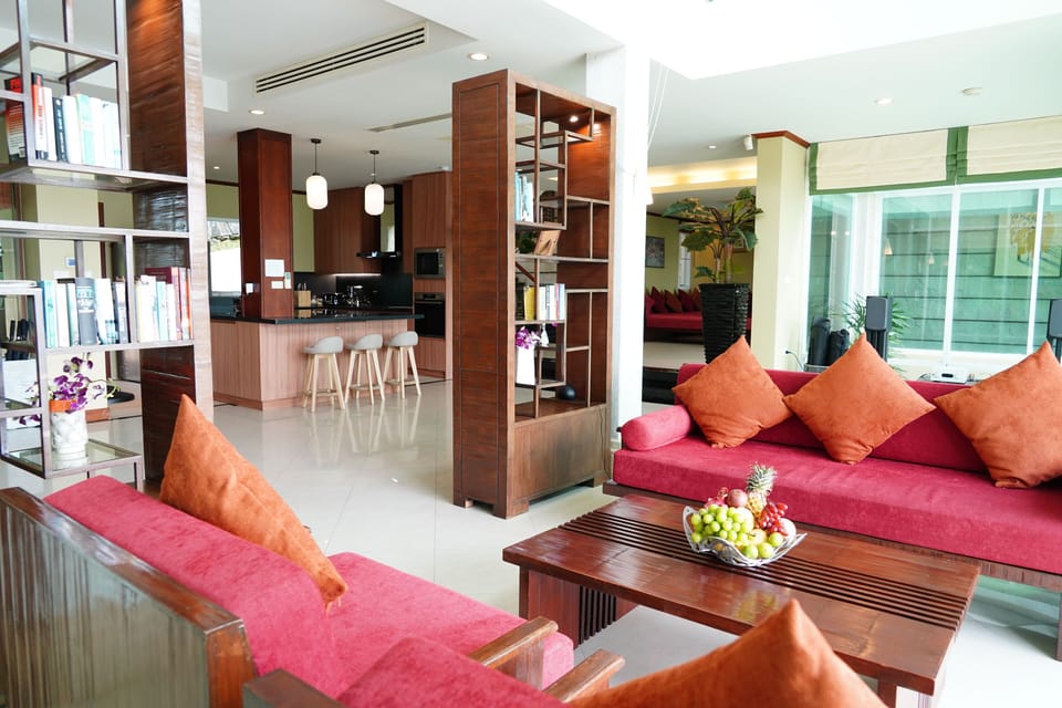 The open plan living area is furnished with locally sourced furniture