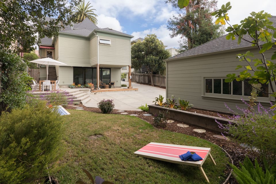 The yard, house and tiki barn 