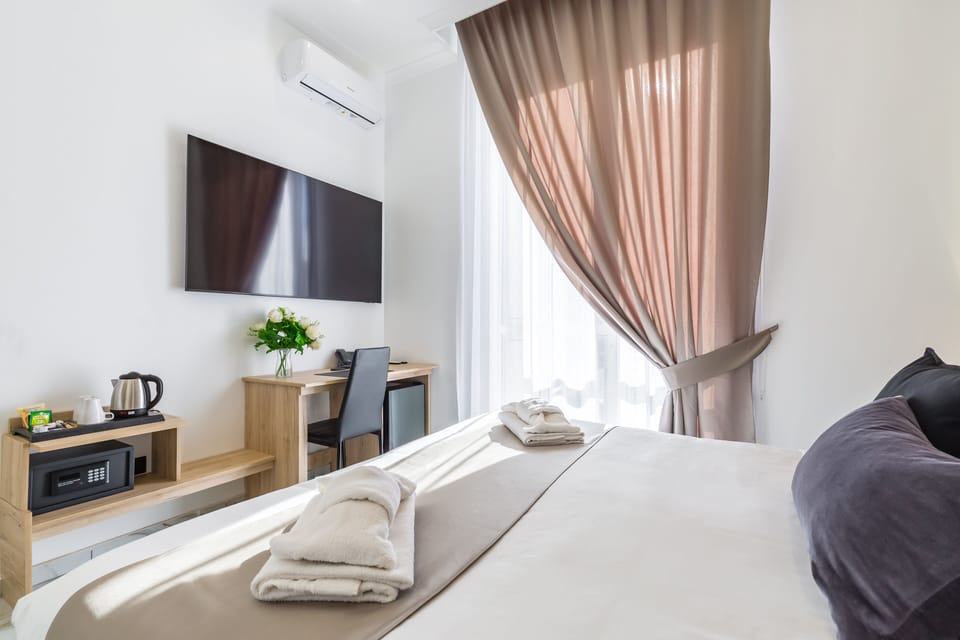 Down comforters, minibar, in-room safe, blackout drapes
