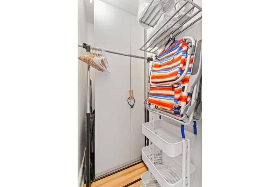 Organized closet with beach chairs
