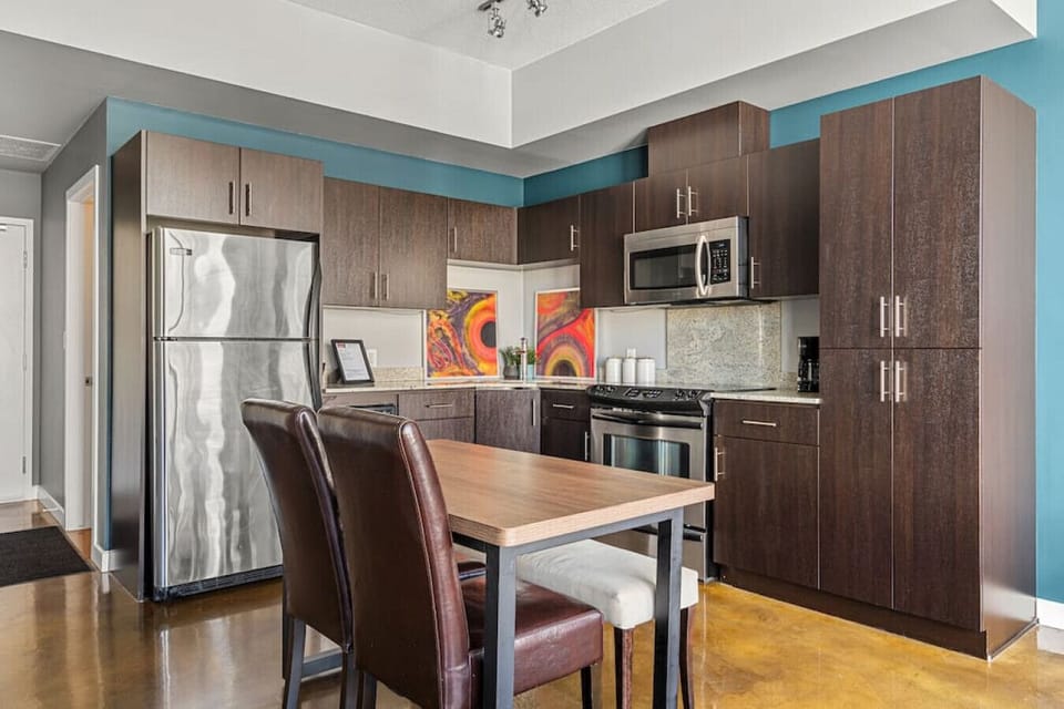 Full kitchen with a drip coffee machine, ground coffee, tea, sugar and basic condiments (ketchup, mustard and relish.)