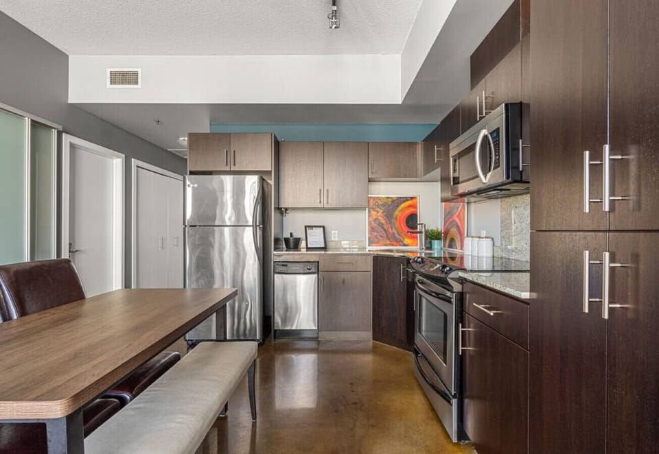 Full kitchen with a drip coffee machine, ground coffee, tea, sugar and basic condiments (ketchup, mustard and relish.)