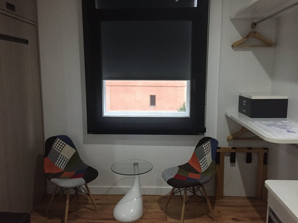Family Room | Desk, blackout drapes, soundproofing, bed sheets