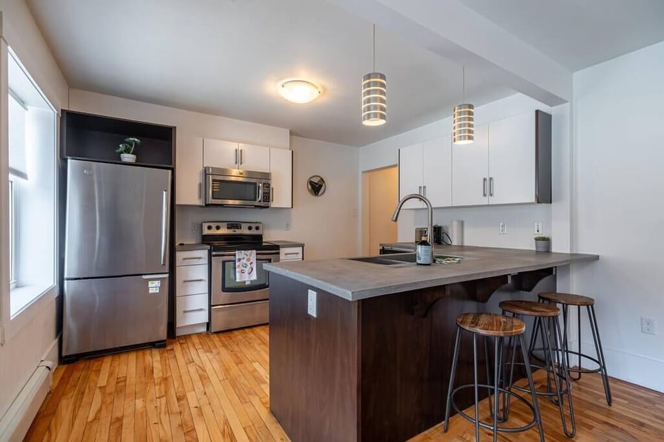 Enjoy a fully equipped space featuring a dishwasher, kettle, oven, stove, and more