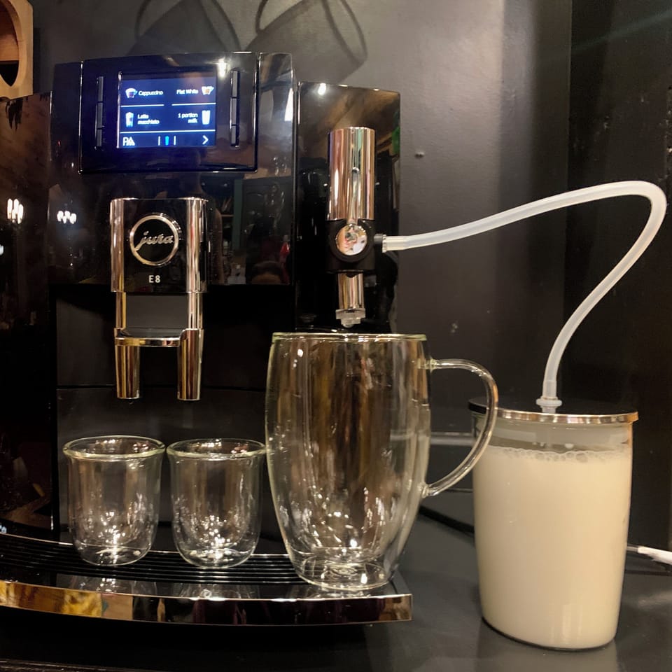 Premium Jura espresso machine with milk frother for café-style drinks