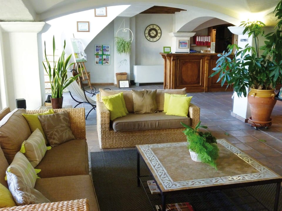 Take a seat in the cozy lounge in the lobby after a day exploring the area.