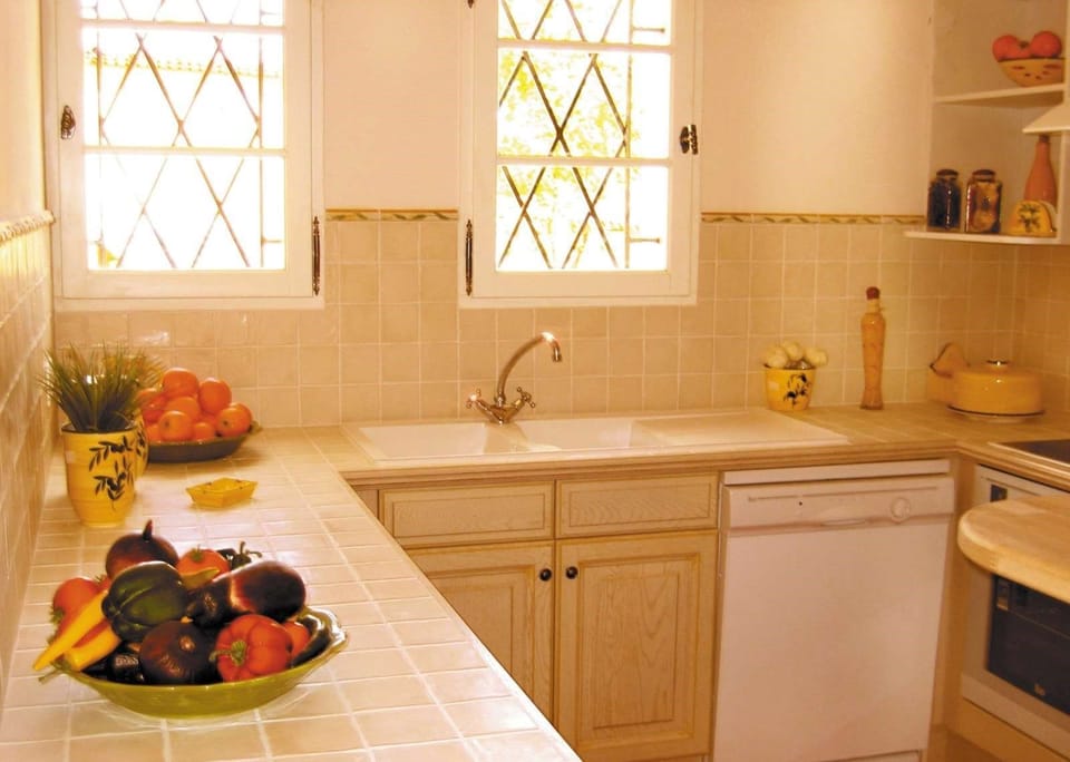 The fully equipped kitchen features everything you need to cook at home.
