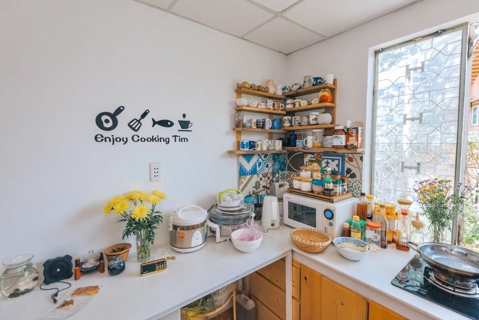 Mini-fridge, microwave, cookware/dishes/utensils, paper towels
