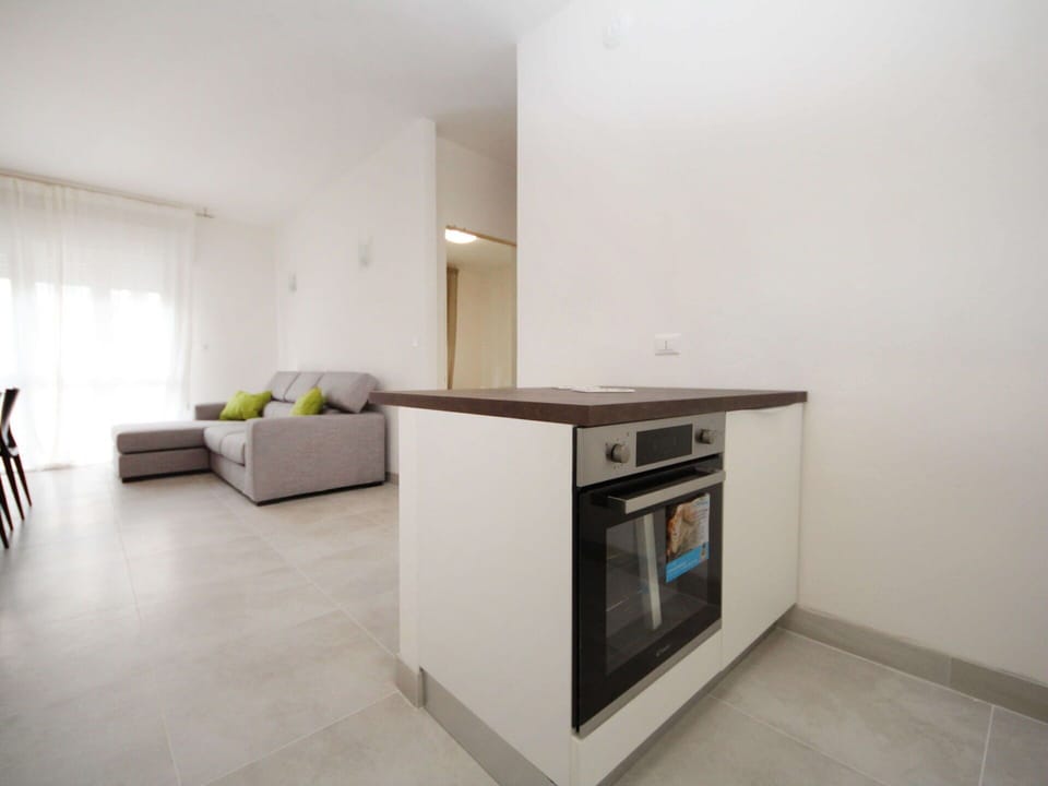 Furniture, Building, Cabinetry, Wood, Comfort, Houseplant, House, Floor, Flooring, Table