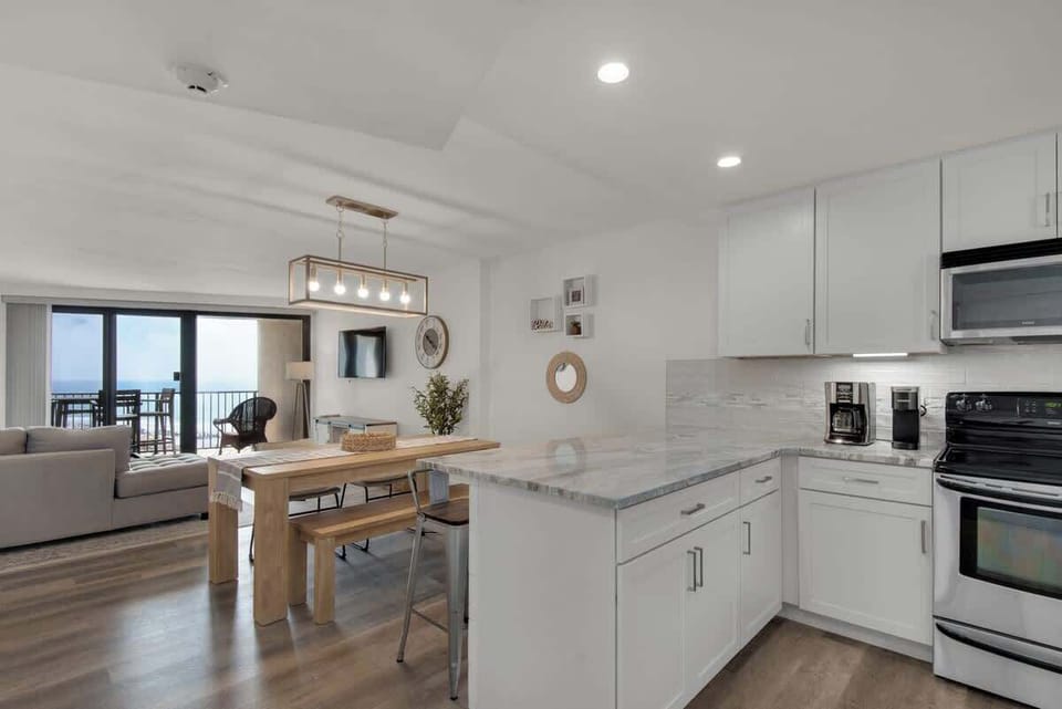 Your Large Kitchen Includes Lots of Open Counter Space and Tons of Cabinetry for Storage. 