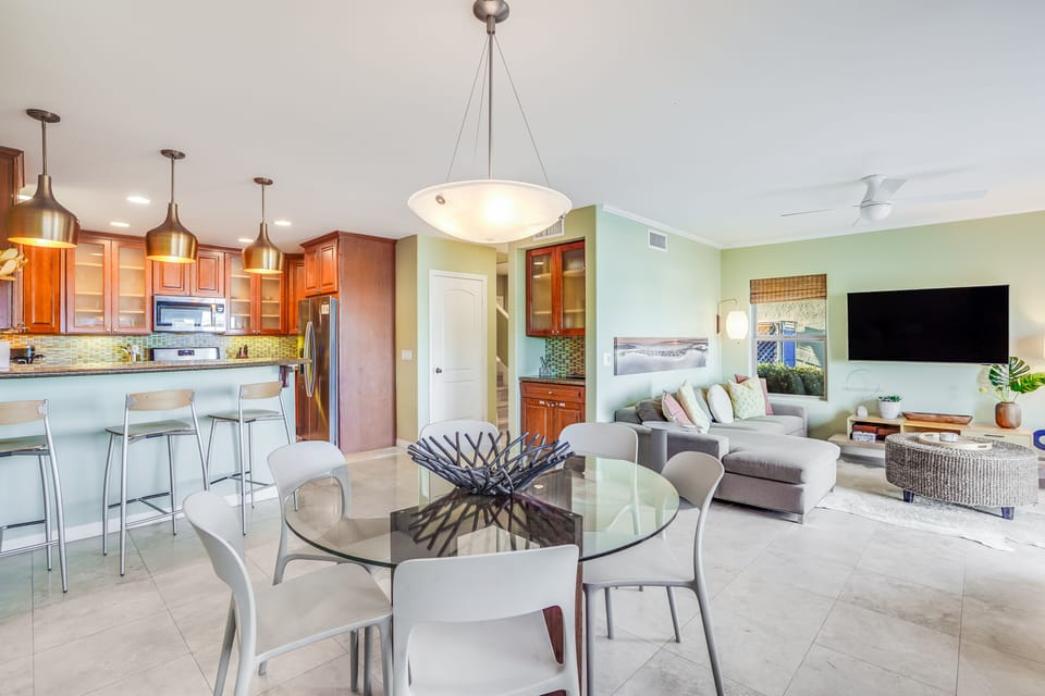 A luminous living area seamlessly integrated with a modern dining space.