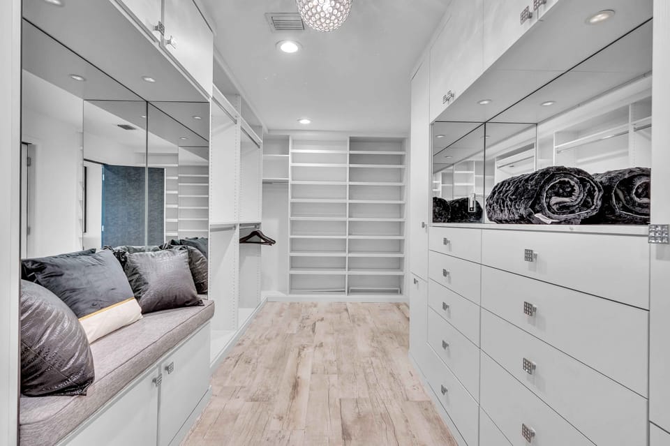 Primary Bedroom walk in closet