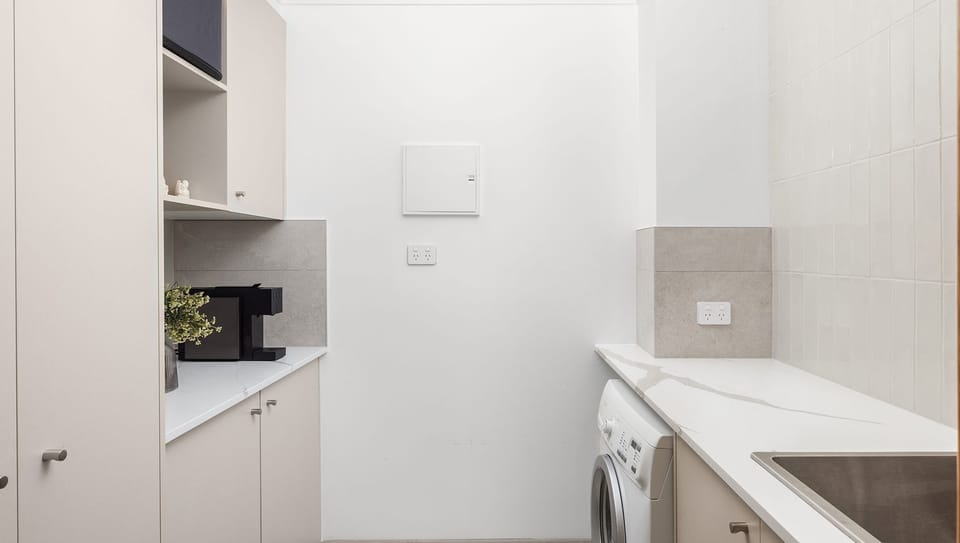 Sunset at the Moorings | Butlers Pantry | Laundry | Washing Machine