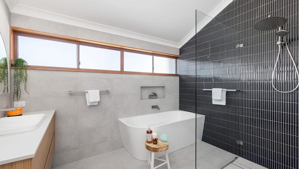 Sunset at the Moorings | Bathroom | Bath | Shower | Linen provided