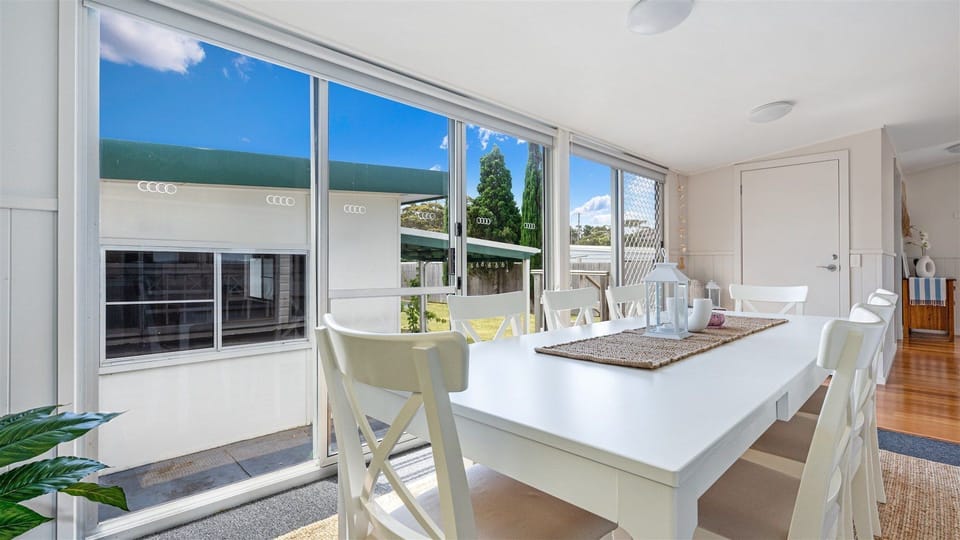 Absolute Beach | Dining Area | Looking out to yard