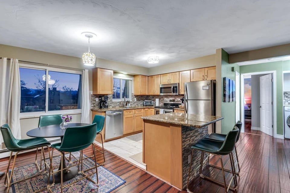 Kitchen, dining space and Island for gathering and grazing. 