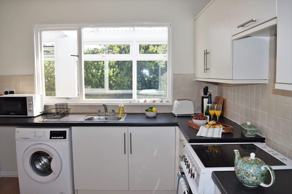 Fridge, electric kettle, toaster, cookware/dishes/utensils