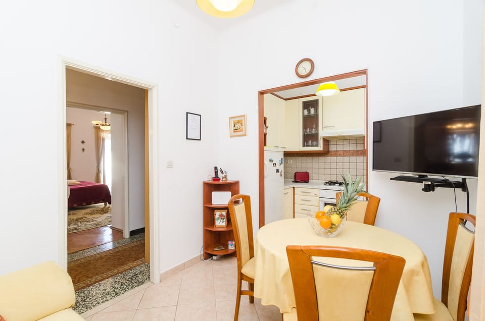Apartment (Two Bedroom Apartment with Sea View a) | Living room | TV