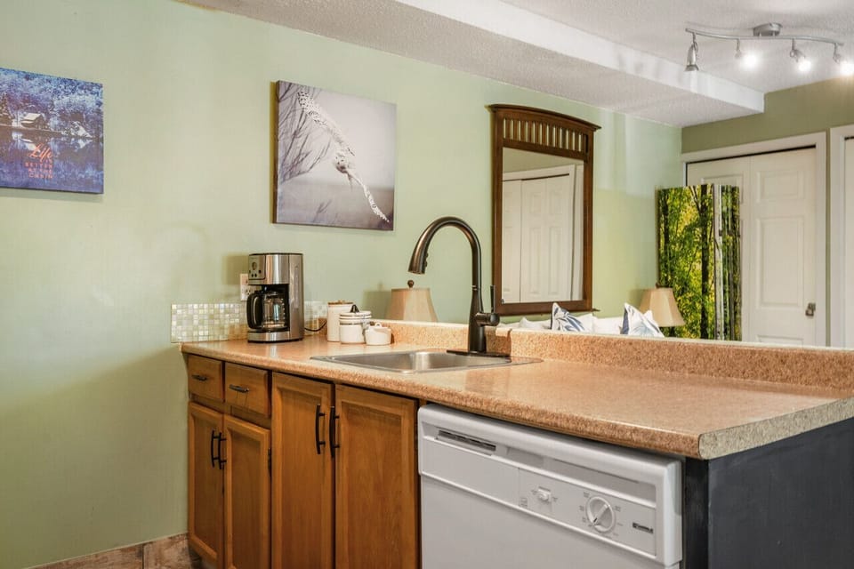 Full kitchen with a drip coffee maker, blender, crockpot & more.