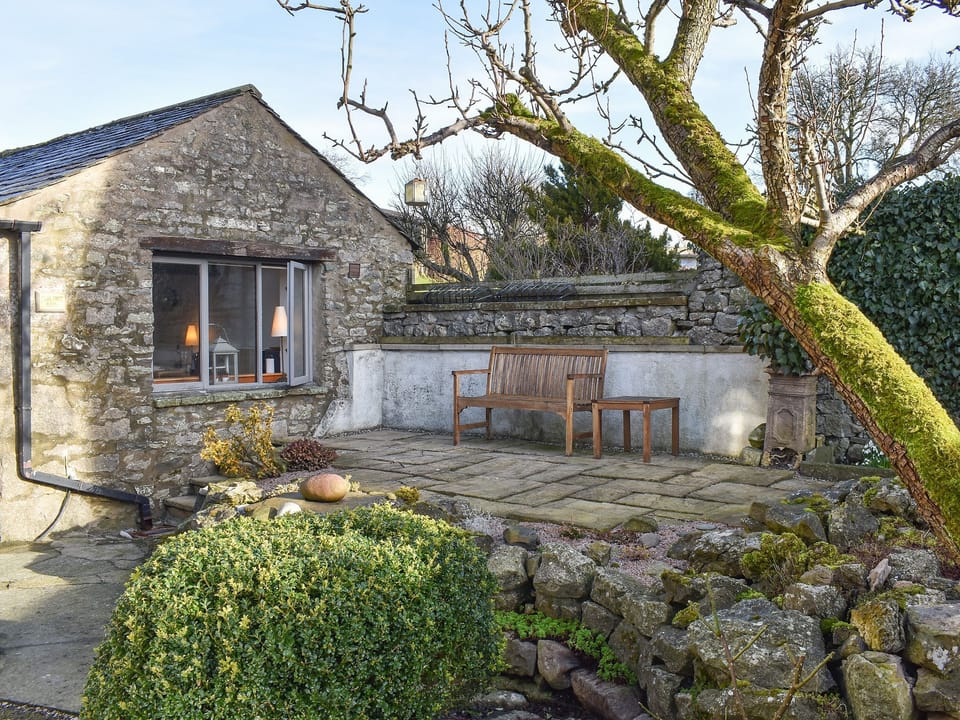 Delightful flagged patio area | Pear Tree Barn, Crooklands near Kendal