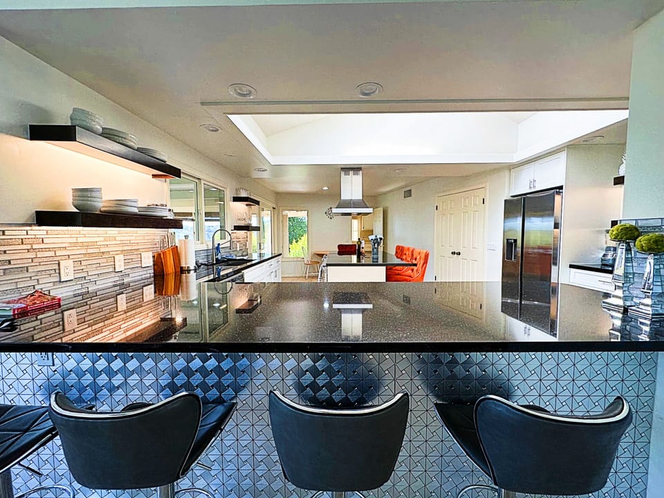 Kitchen connects to living room for seamless entertaining