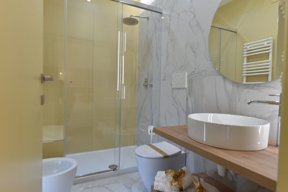 Superior Triple Room, 1 Queen Bed with Sofa bed, Non Smoking | Bathroom | Shower, rainfall showerhead, free toiletries, hair dryer