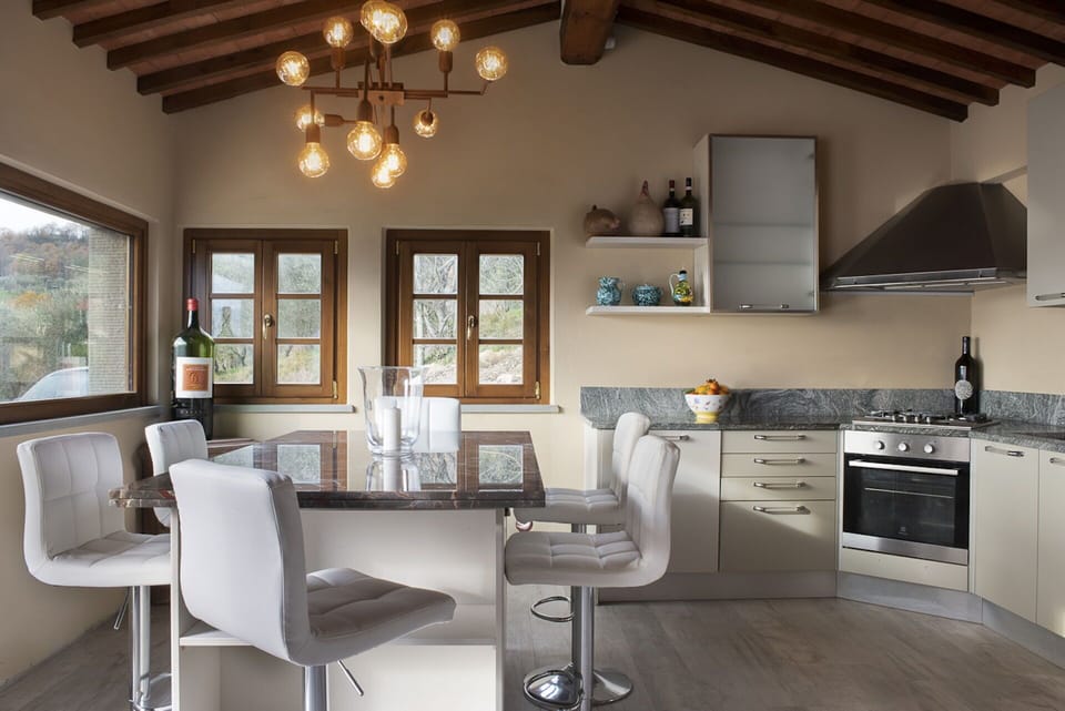 Furniture, Cabinetry, Property, Table, Countertop, Window, Chair, Lighting, Wood, Kitchen Stove