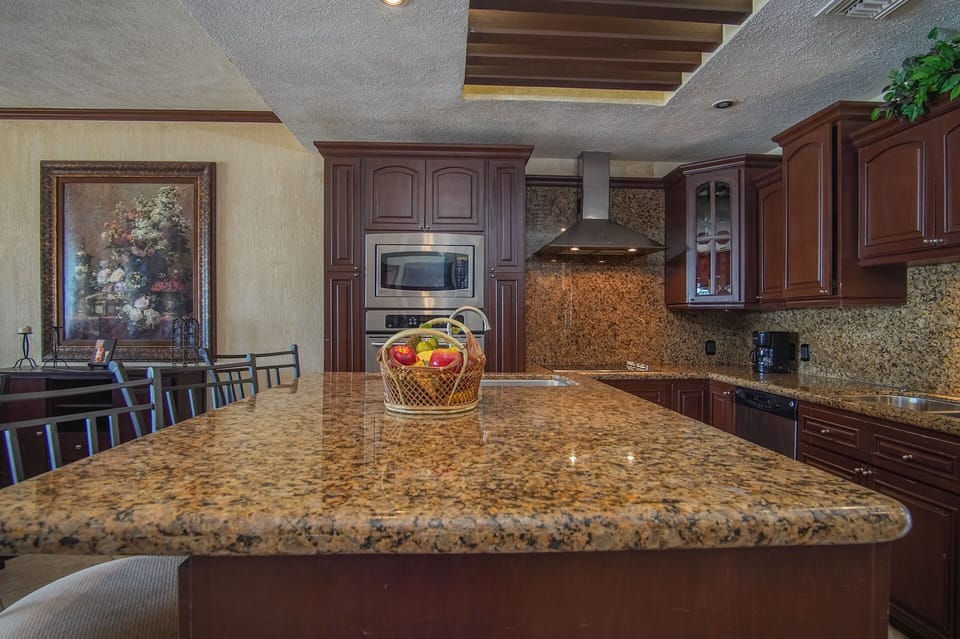 The kitchen is large, and laid out comfortably