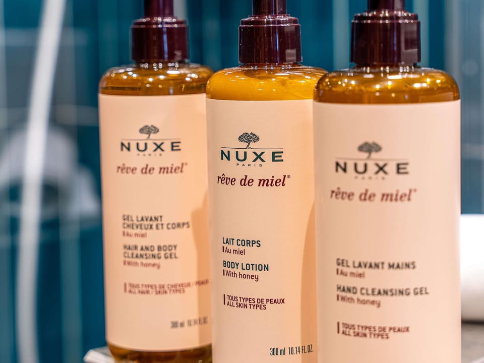 Eco-friendly toiletries, hair dryer, bidet, towels