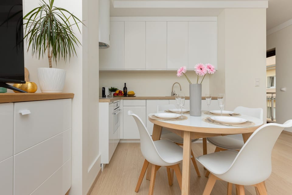 Fully equipped kitchenette with functional appliances.