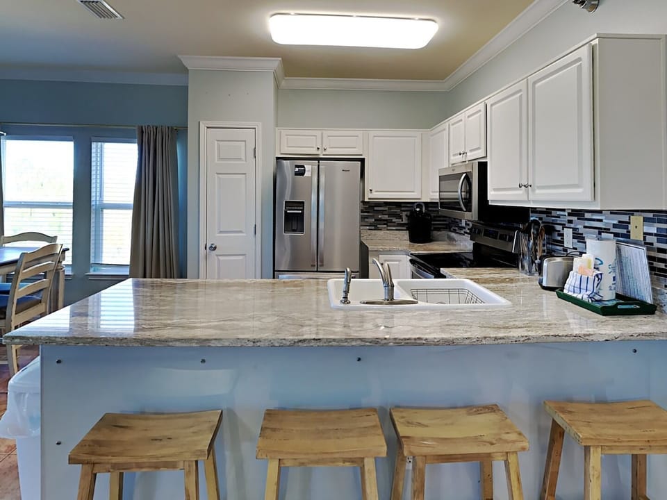 Condo, Multiple Beds, Balcony | Private kitchen | Fridge, microwave, oven, stovetop