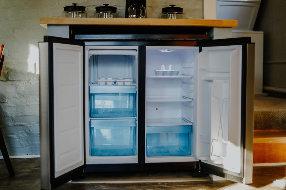 Inside view of the fridge and freezer. 