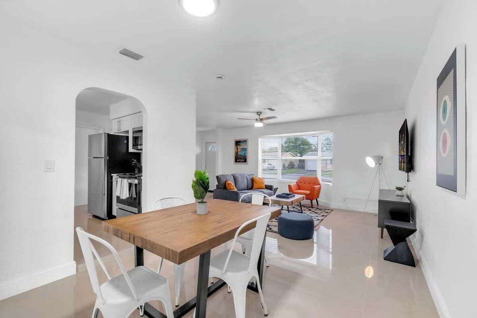 "Bright, open-concept Airbnb with stylish dining, cozy lounge, and natural light—perfect for relaxing stays, family trips, or remote work getaways."