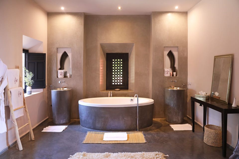 Suite Sirius | Bathroom | Designer toiletries, hair dryer, towels, soap