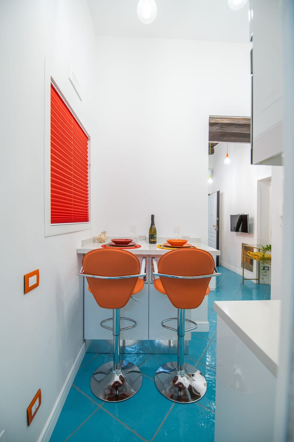 Deluxe Condo | Living area | 40-inch flat-screen TV with cable channels, TV