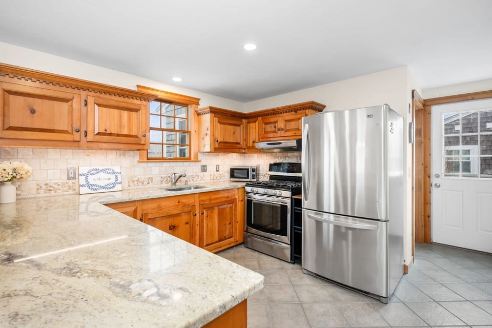 Kitchen with stainless steel appliances.