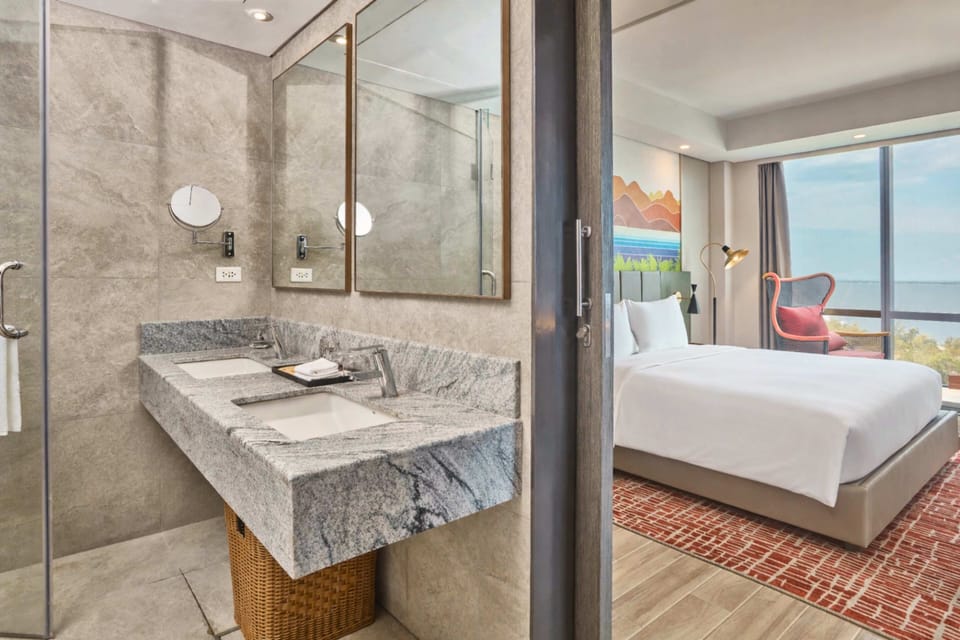 Suite, 1 King Bed with Sofa bed, Ocean View | Bathroom | Shower, rainfall showerhead, eco-friendly toiletries, hair dryer