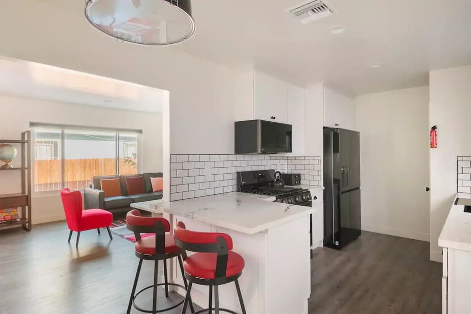 Granite bar countertop with leather bar stools for dining 